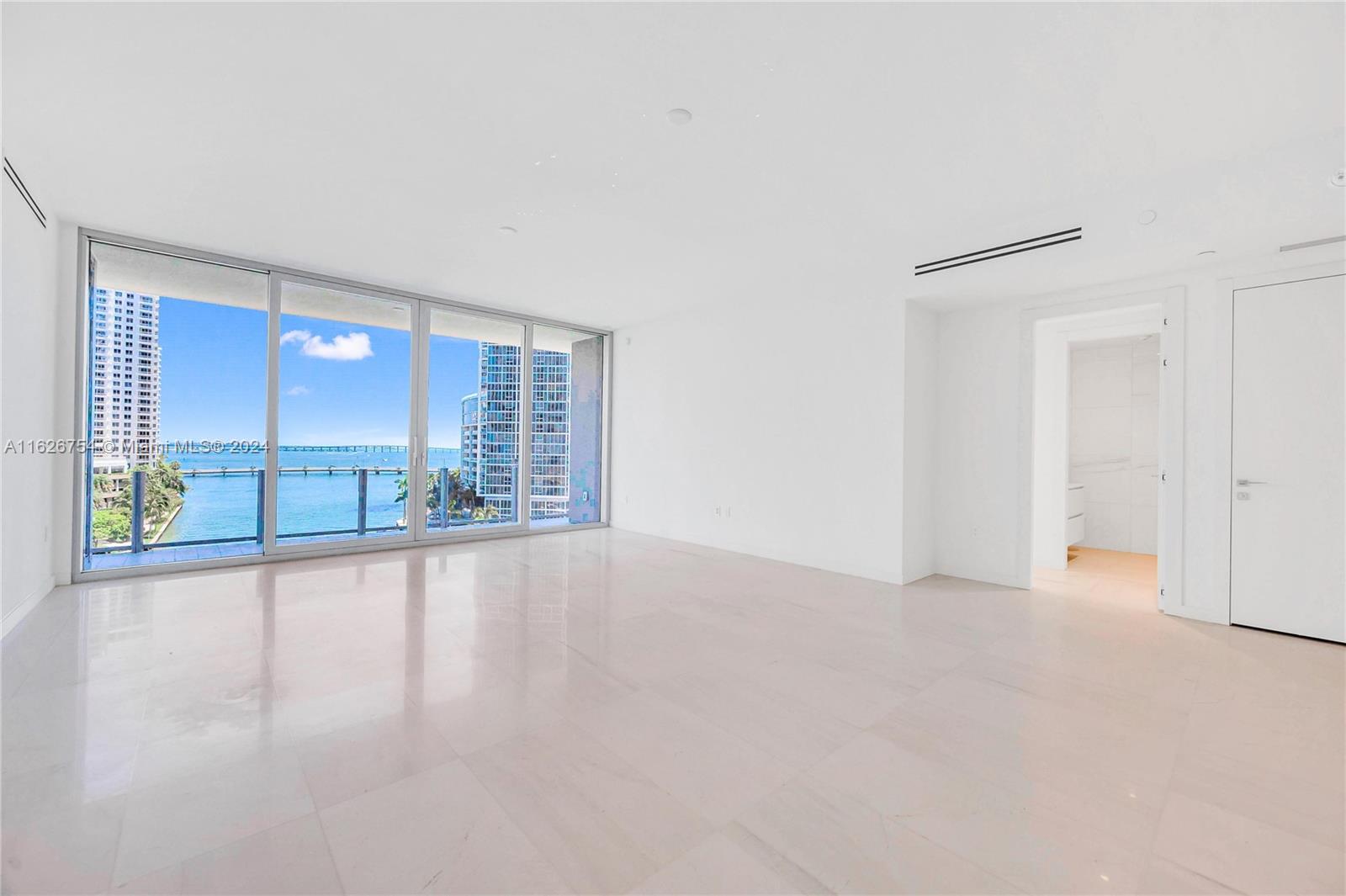 300 Biscayne Blvd Way, Unit 703 Miami, FL 33131 - Photo 3 of 27 a view of an empty room with a window