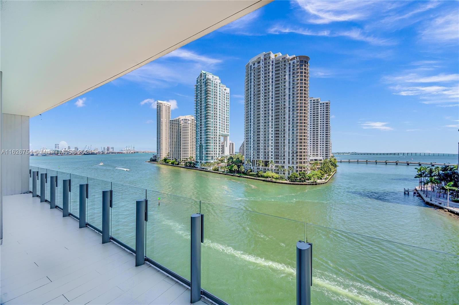 300 Biscayne Blvd Way, Unit 703 Miami, FL 33131 - Photo 5 of 27 a view of a balcony with dining area