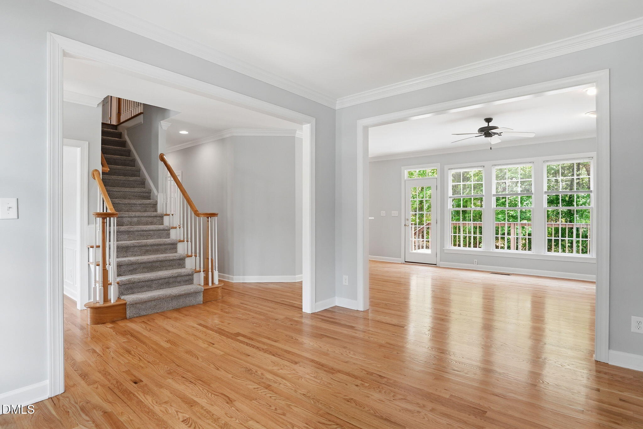 7 Morgans Ridge Lane Durham, NC 27707 - Photo 16 of 75 a view of an entryway with wooden floor and stairs