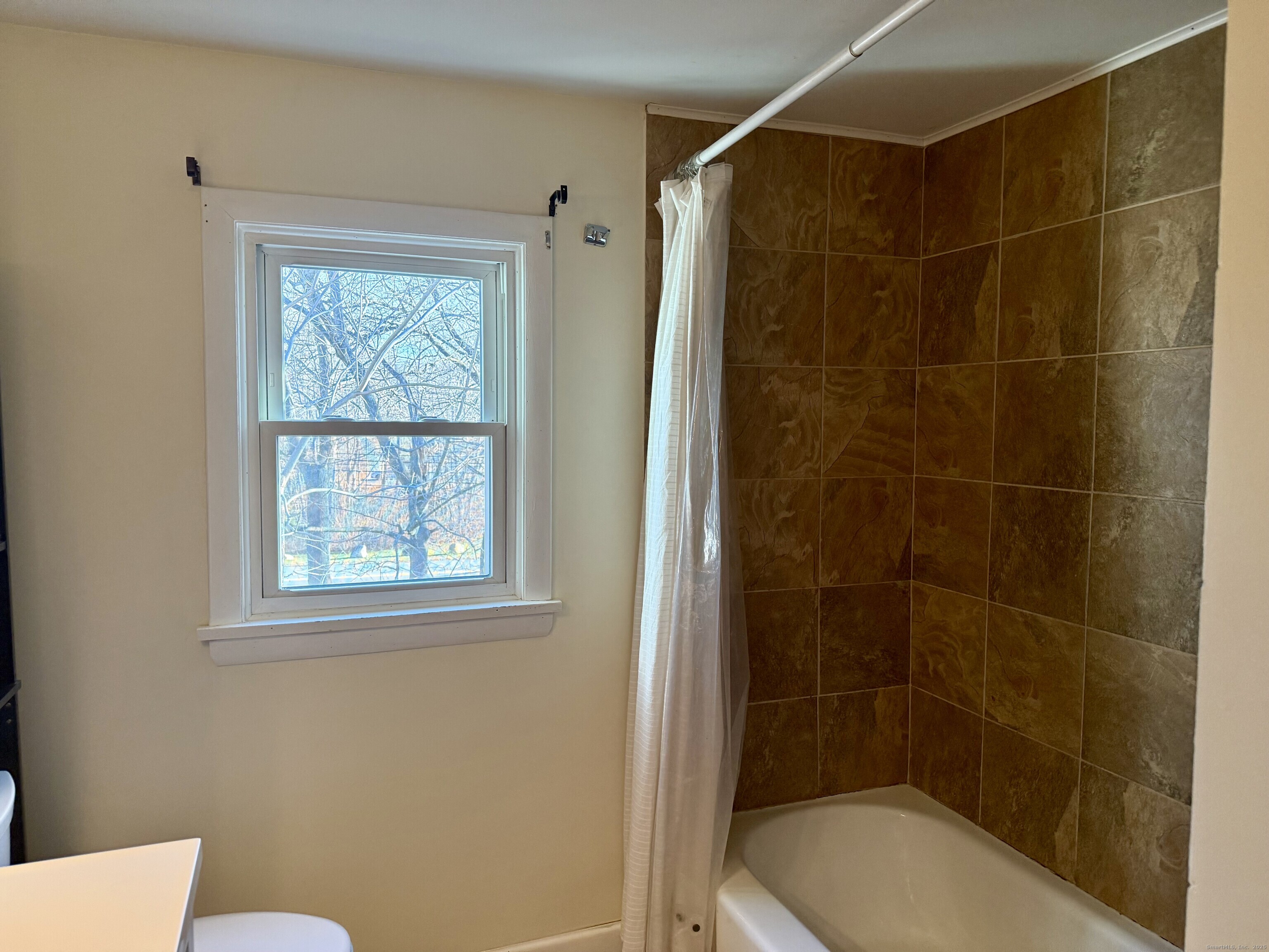 100 Lebanon Avenue Colchester, CT 06415 - Photo 13 of 17 a bathroom with a toilet and shower
