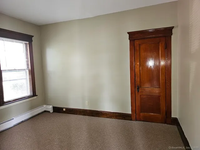 an empty room with window