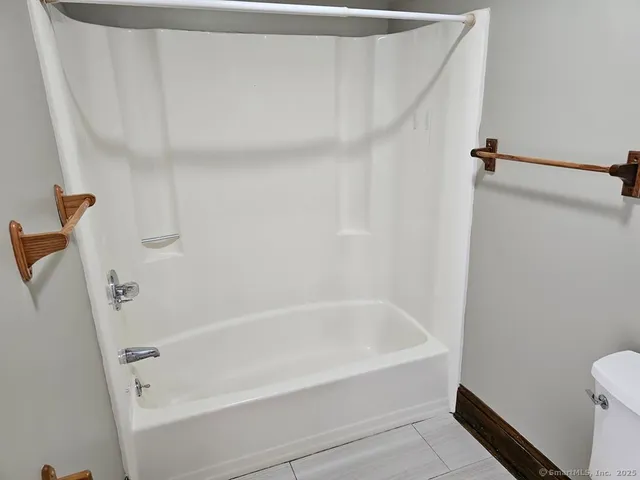 a bathroom with a bathtub
