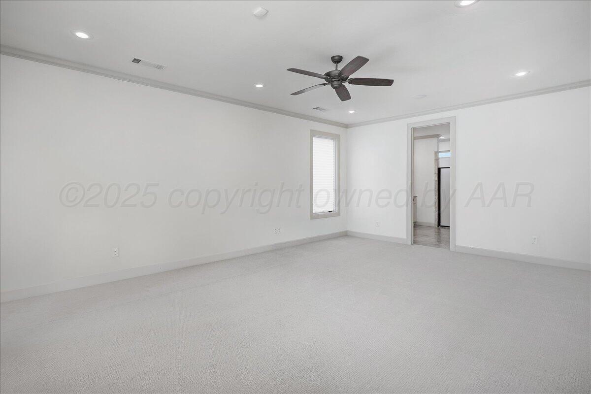 6107 Blue Sage Circle Amarillo, TX 79124 - Photo 32 of 79 an empty room with a ceiling fan and window