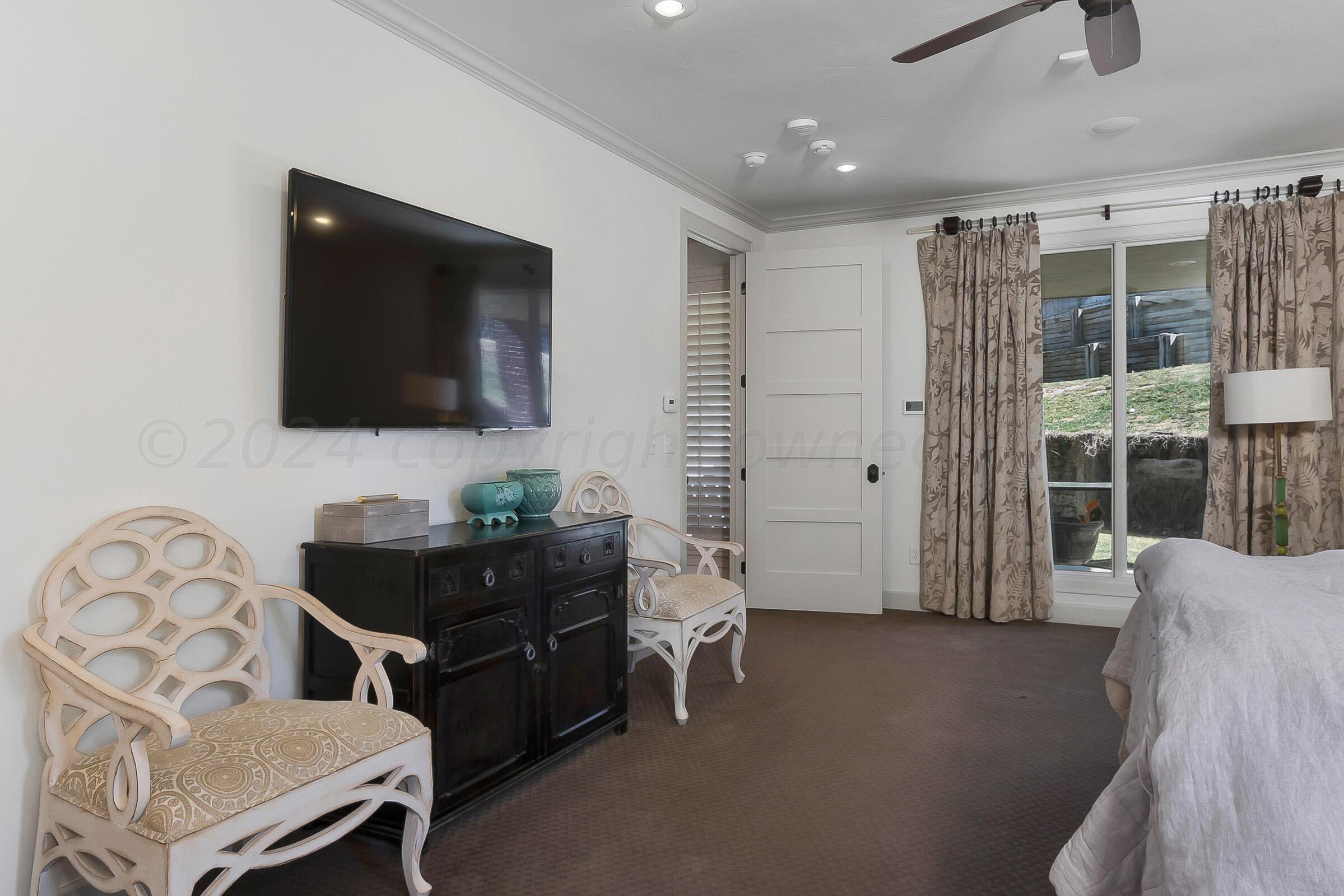 6107 Blue Sage Circle Amarillo, TX 79124 - Photo 34 of 79 a living room with furniture and a flat screen tv