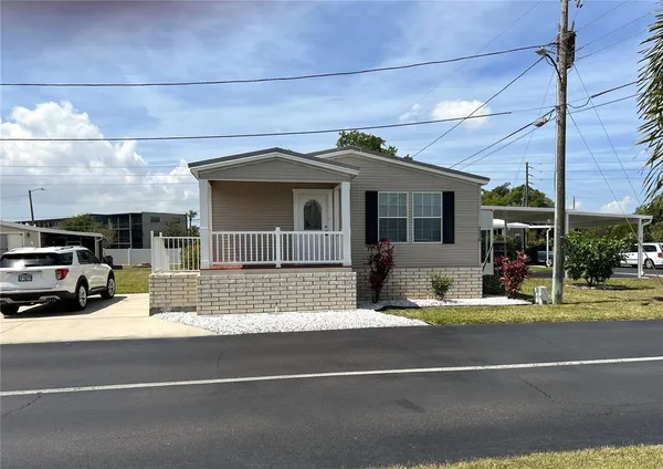 a view of a house with a patio