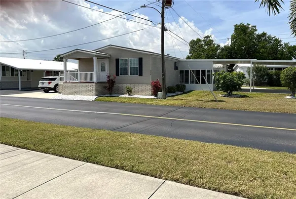 a view of a city street from a house