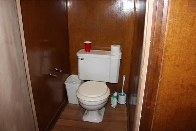 a bathroom with a toilet and a sink