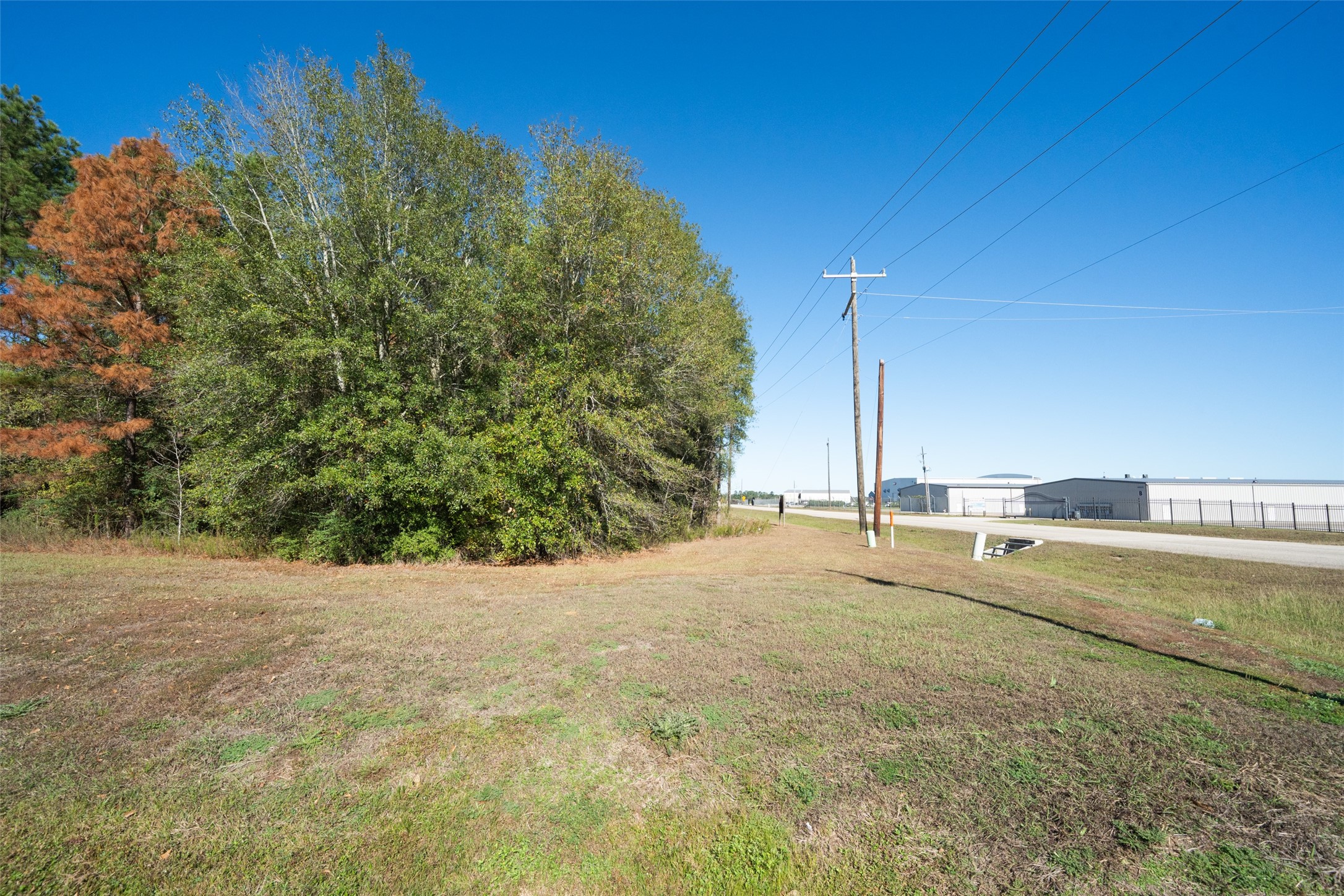 10023 Airport Road Conroe, TX 77303 - Photo 7 of 9 a view of a backyard