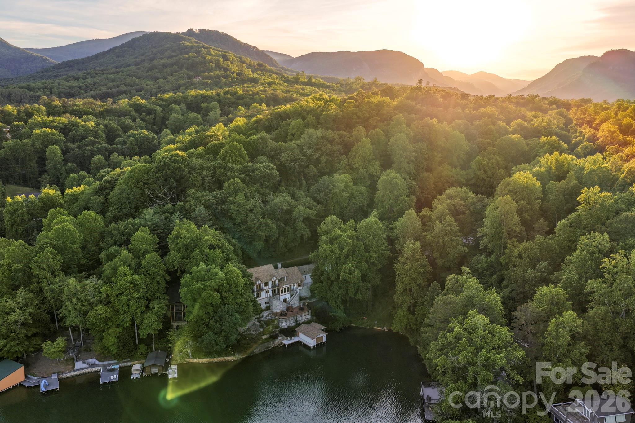 151 Garner Road Lake Lure, NC 28746 - Photo 47 of 48 a view of a town with mountains in the background