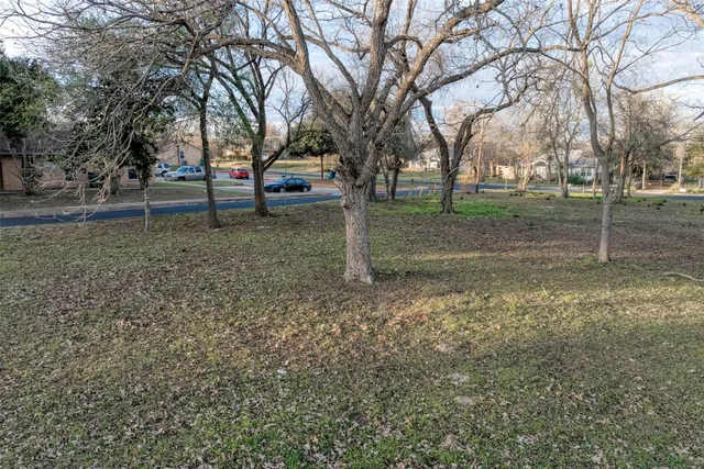 a view of road with trees