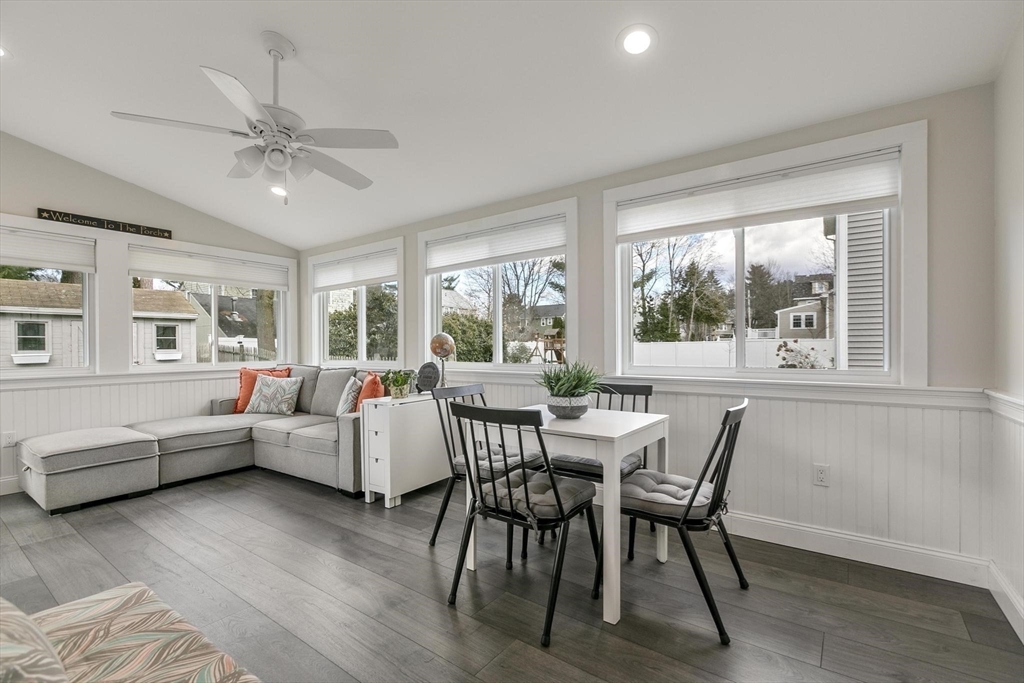 19 Dustin Road Reading, MA 01867 - Photo 22 of 33 a living room with furniture and a large window