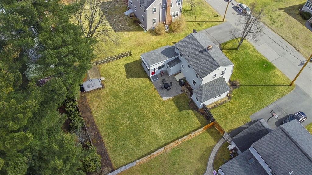 19 Dustin Road Reading, MA 01867 - Photo 3 of 33 an aerial view of residential house with outdoor space and swimming pool