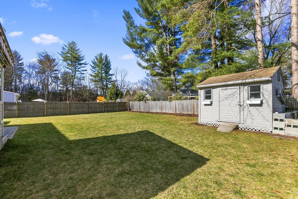 19 Dustin Road Reading, MA 01867 - Photo 31 of 33 a view of a house with a yard