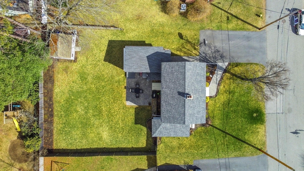 19 Dustin Road Reading, MA 01867 - Photo 32 of 33 a aerial view of a house with a yard