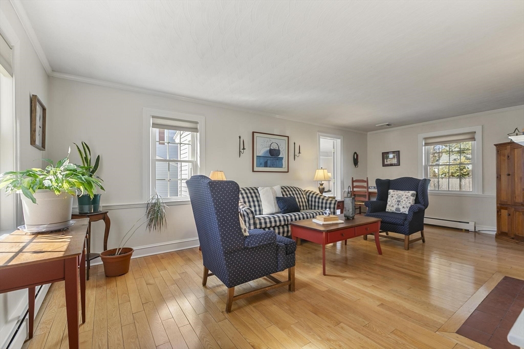 19 Dustin Road Reading, MA 01867 - Photo 7 of 33 a living room with furniture and wooden floor