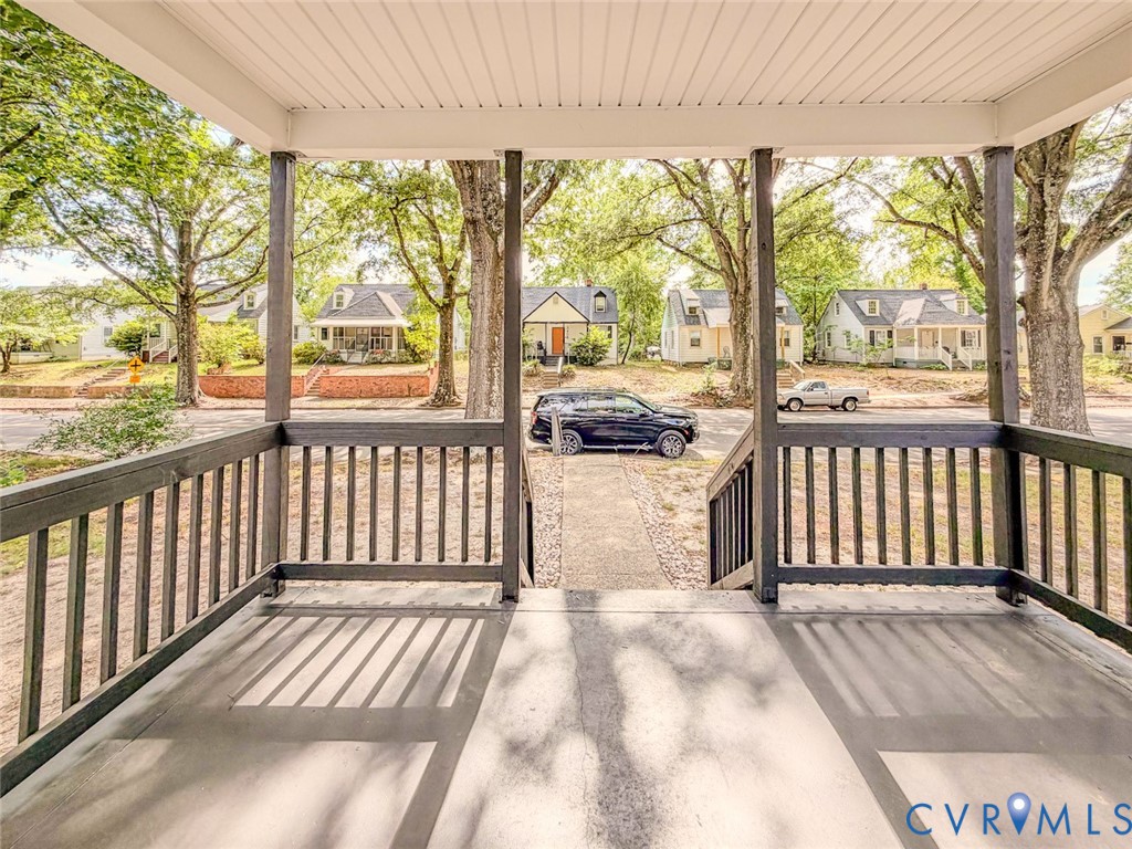3409 Meadowbridge Road Richmond, VA 23222 - Photo 30 of 32 a view of a two chairs in the porch