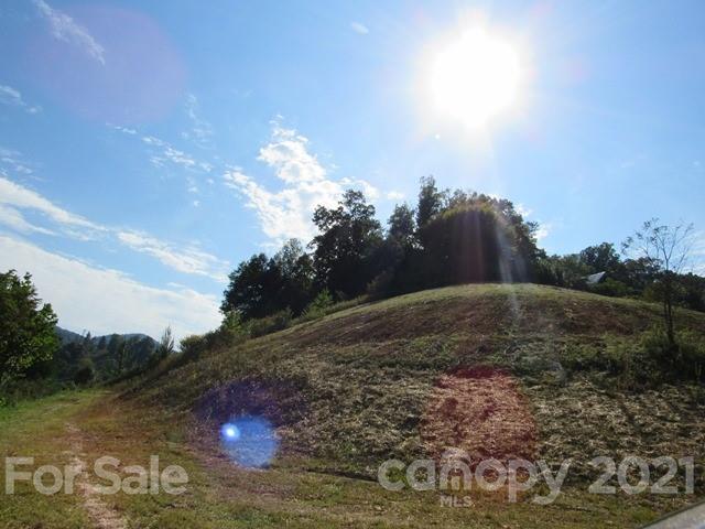 Tbd-5 Ivy Ridge Road Burnsville, NC 28714 - Photo 18 of 18 a view of a lake with mountains in the background