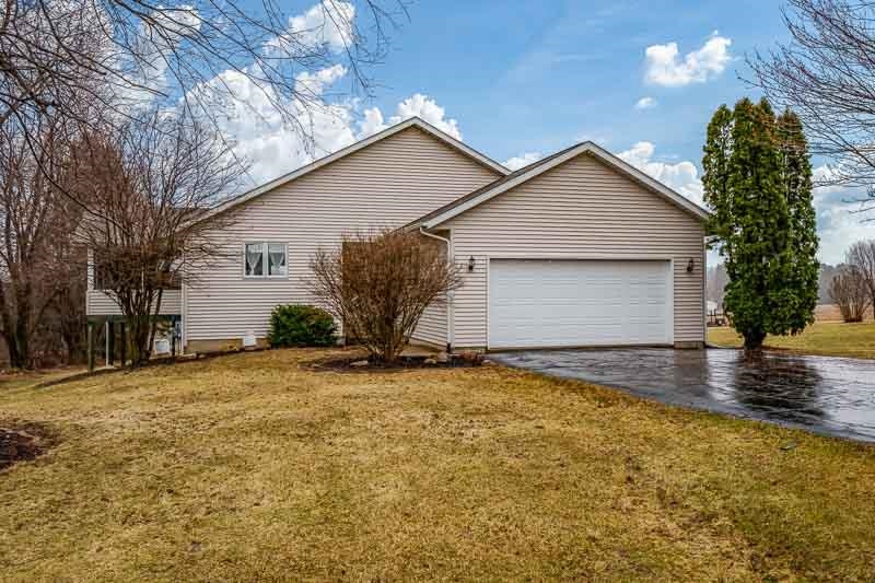 186 Lake Summerset Road Davis, IL 61019 - Photo 1 of 58 a view of a house with a yard and garage