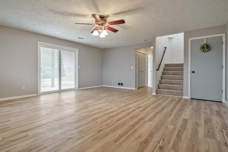 186 Lake Summerset Road Davis, IL 61019 - Photo 25 of 58 wooden floor in an empty room with a window