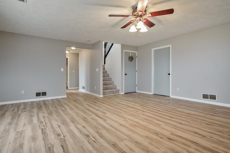 186 Lake Summerset Road Davis, IL 61019 - Photo 26 of 58 a view of empty room with wooden floor and fan