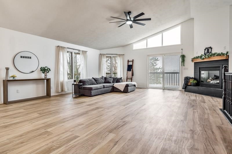 186 Lake Summerset Road Davis, IL 61019 - Photo 3 of 58 a living room with furniture and a wooden floor