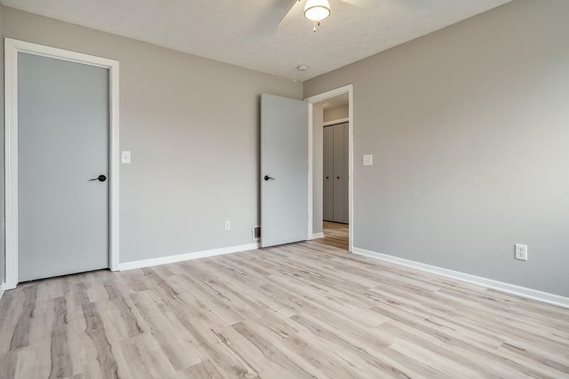 186 Lake Summerset Road Davis, IL 61019 - Photo 32 of 58 a view of an empty room with wooden floor