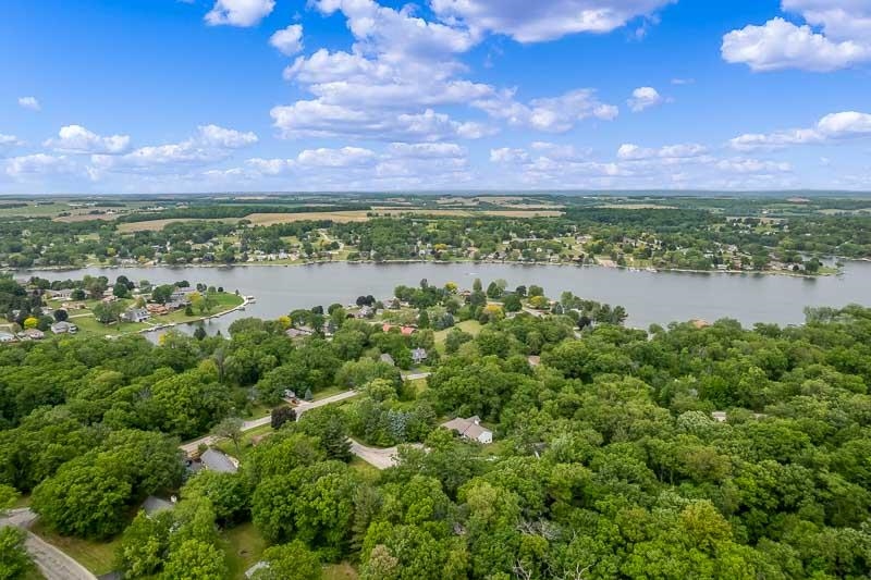 186 Lake Summerset Road Davis, IL 61019 - Photo 43 of 58 a view of a lake with a building in the background