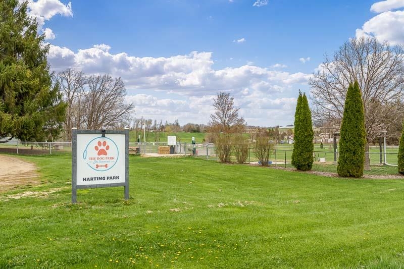 186 Lake Summerset Road Davis, IL 61019 - Photo 54 of 58 a sign that is sitting in the grass with palm trees