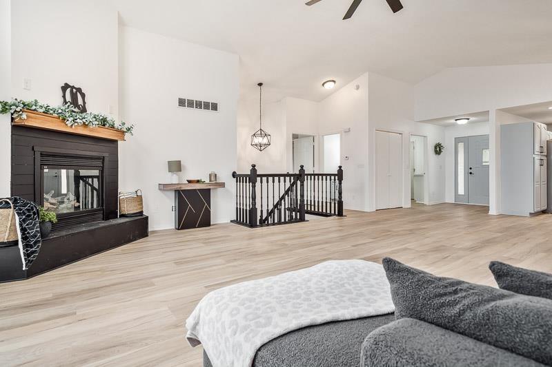 186 Lake Summerset Road Davis, IL 61019 - Photo 7 of 58 a bedroom with a bed and a chandelier