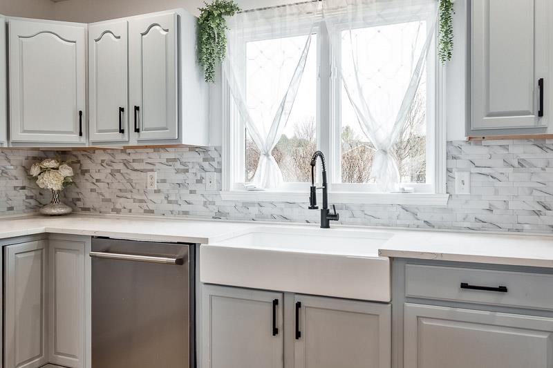 186 Lake Summerset Road Davis, IL 61019 - Photo 10 of 58 a kitchen with appliances cabinets and a sink
