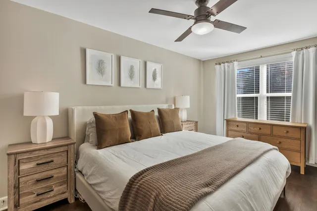 a bedroom with a bed and a closet