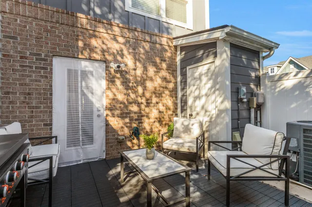 a view of a outdoor seating area with furniture