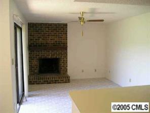 11036 Running Ridge Road Charlotte, NC 28226 - Photo 5 of 8 a view of a livingroom with a fireplace