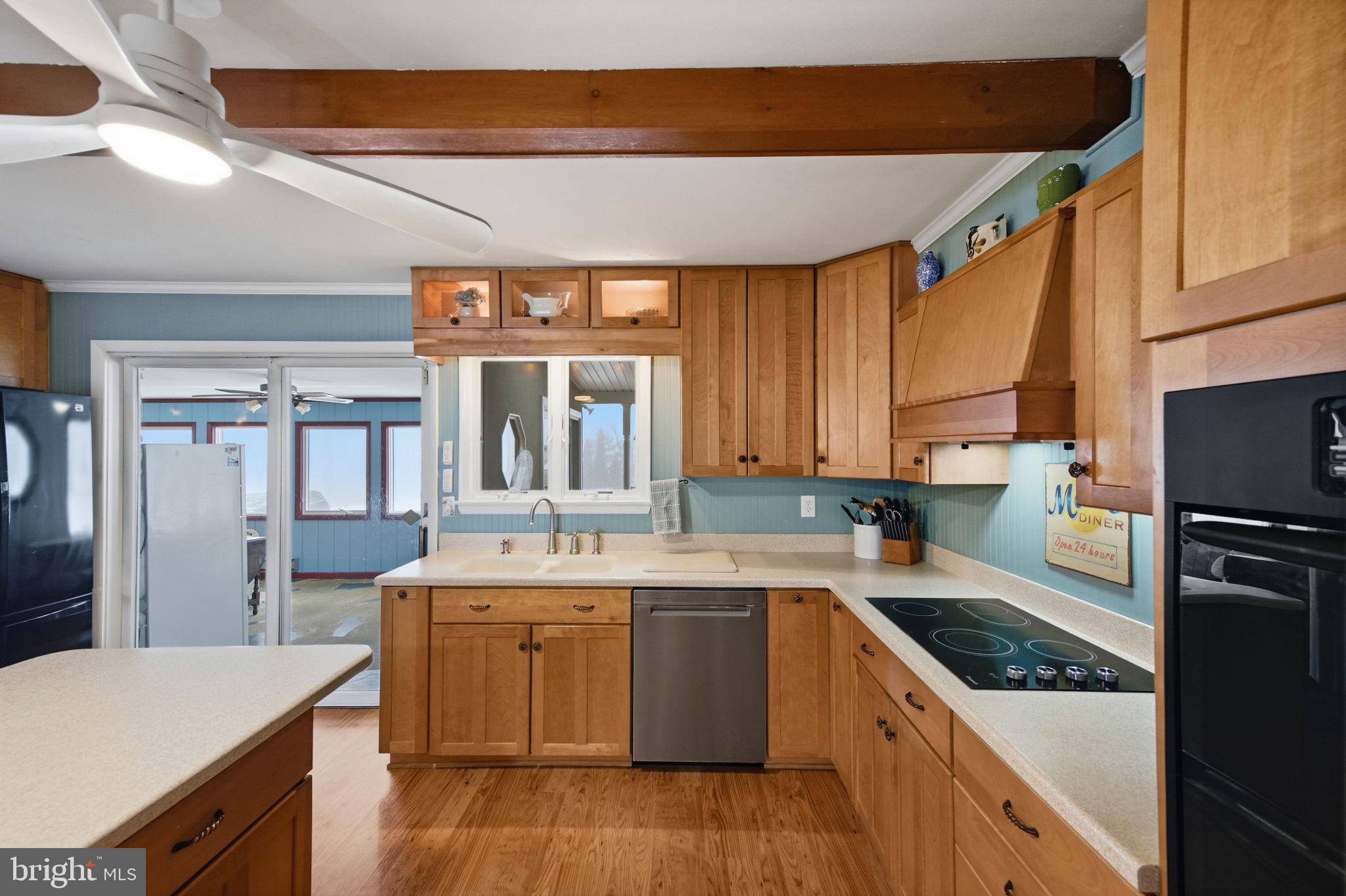 3975 Street Road Street, MD 21154 - Photo 14 of 78 a kitchen with a sink stove and cabinets
