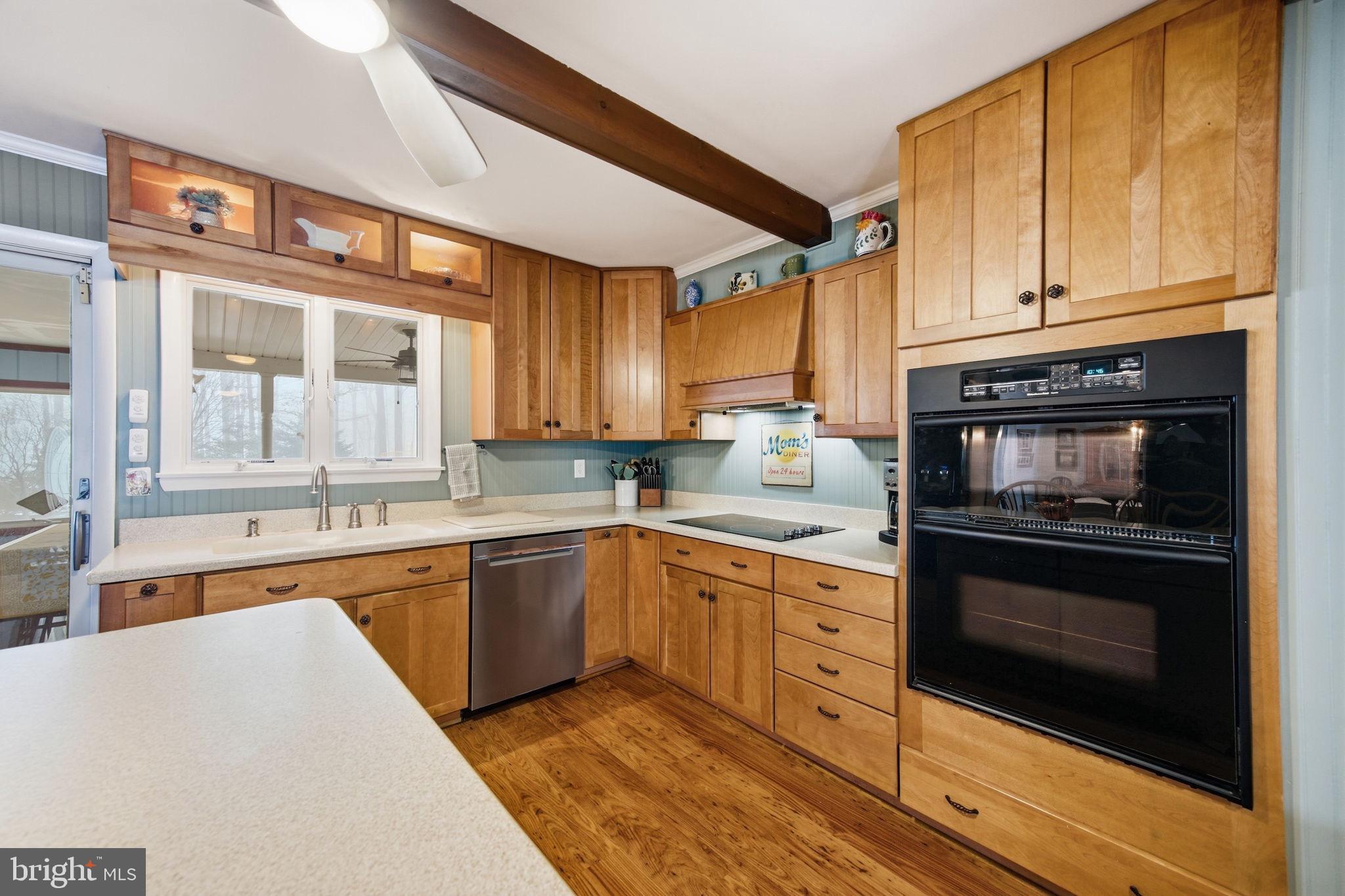 3975 Street Road Street, MD 21154 - Photo 16 of 78 a kitchen with stainless steel appliances granite countertop a stove and cabinets