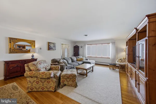 a view of a livingroom with furniture