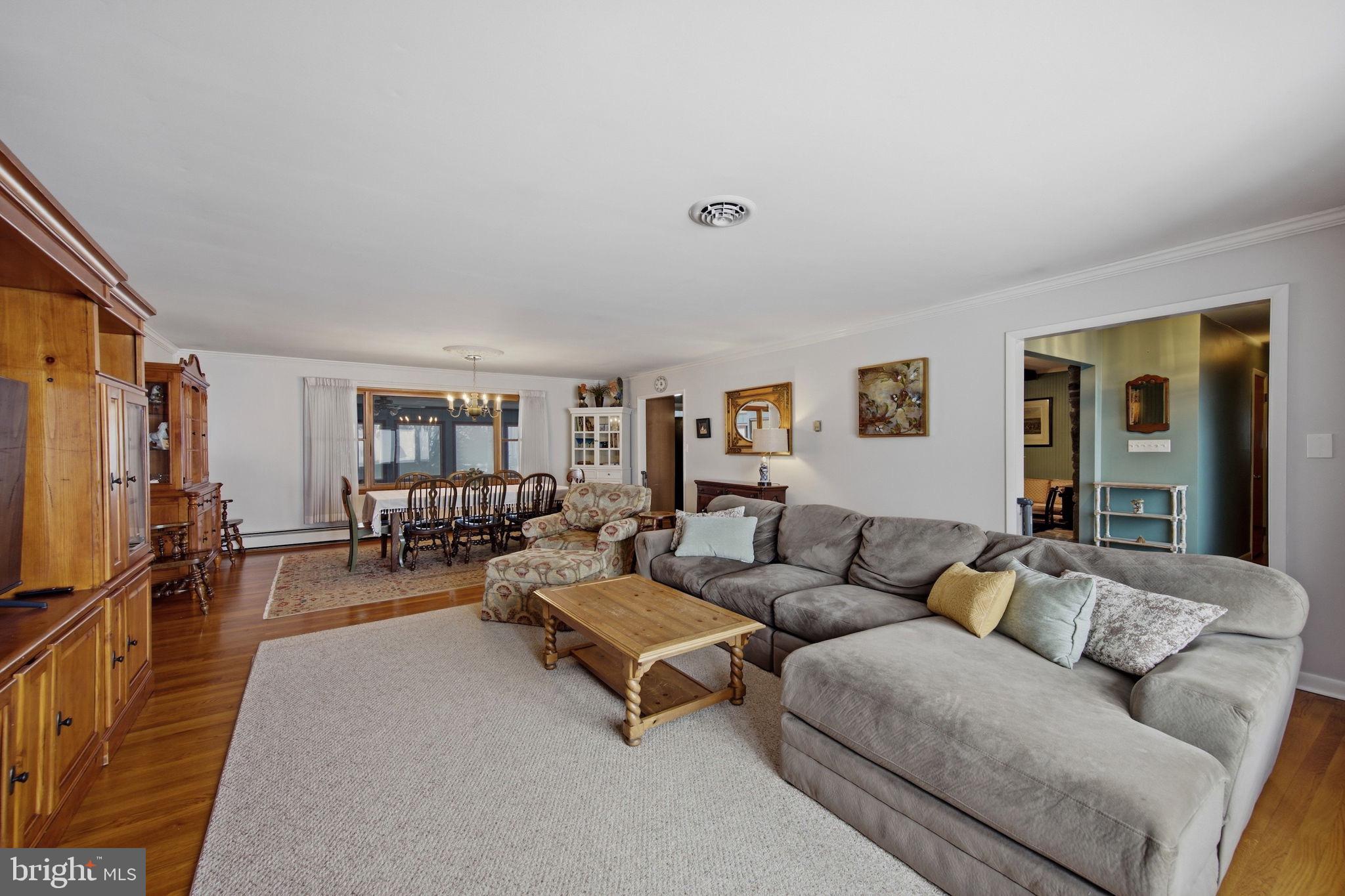 3975 Street Road Street, MD 21154 - Photo 24 of 78 a living room with furniture and a flat screen tv