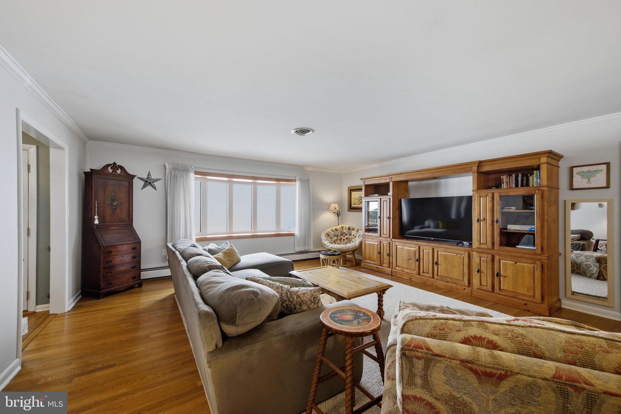 3975 Street Road Street, MD 21154 - Photo 26 of 78 a living room with furniture and a flat screen tv
