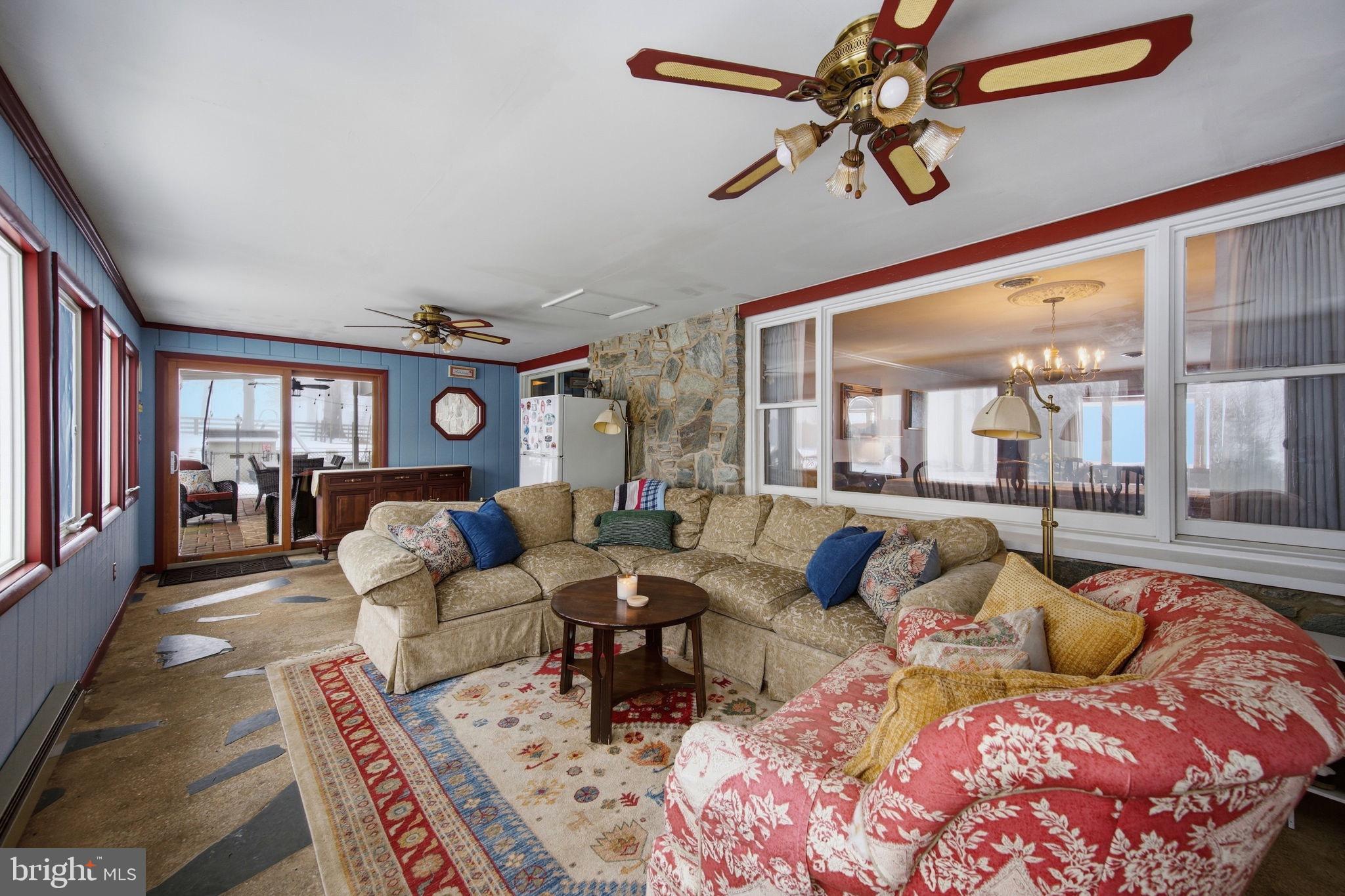 3975 Street Road Street, MD 21154 - Photo 29 of 78 a living room with furniture ceiling fan and a rug