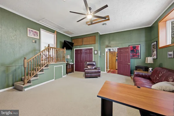 a bed room with a bed and a dresser