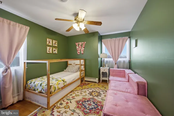 a bathroom with a sink a mirror and a toilet