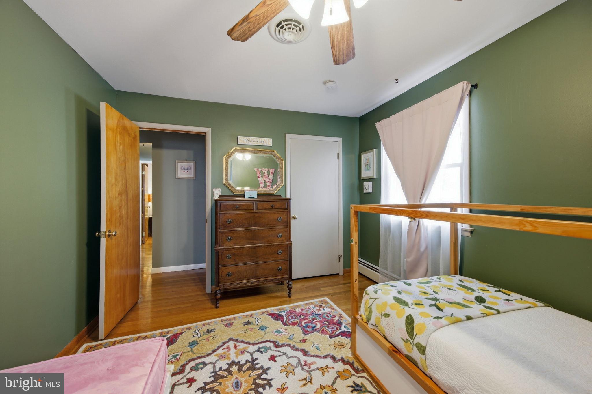 3975 Street Road Street, MD 21154 - Photo 41 of 78 a bedroom with a bed and wooden floor