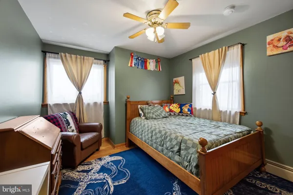 a view of a backyard with tree