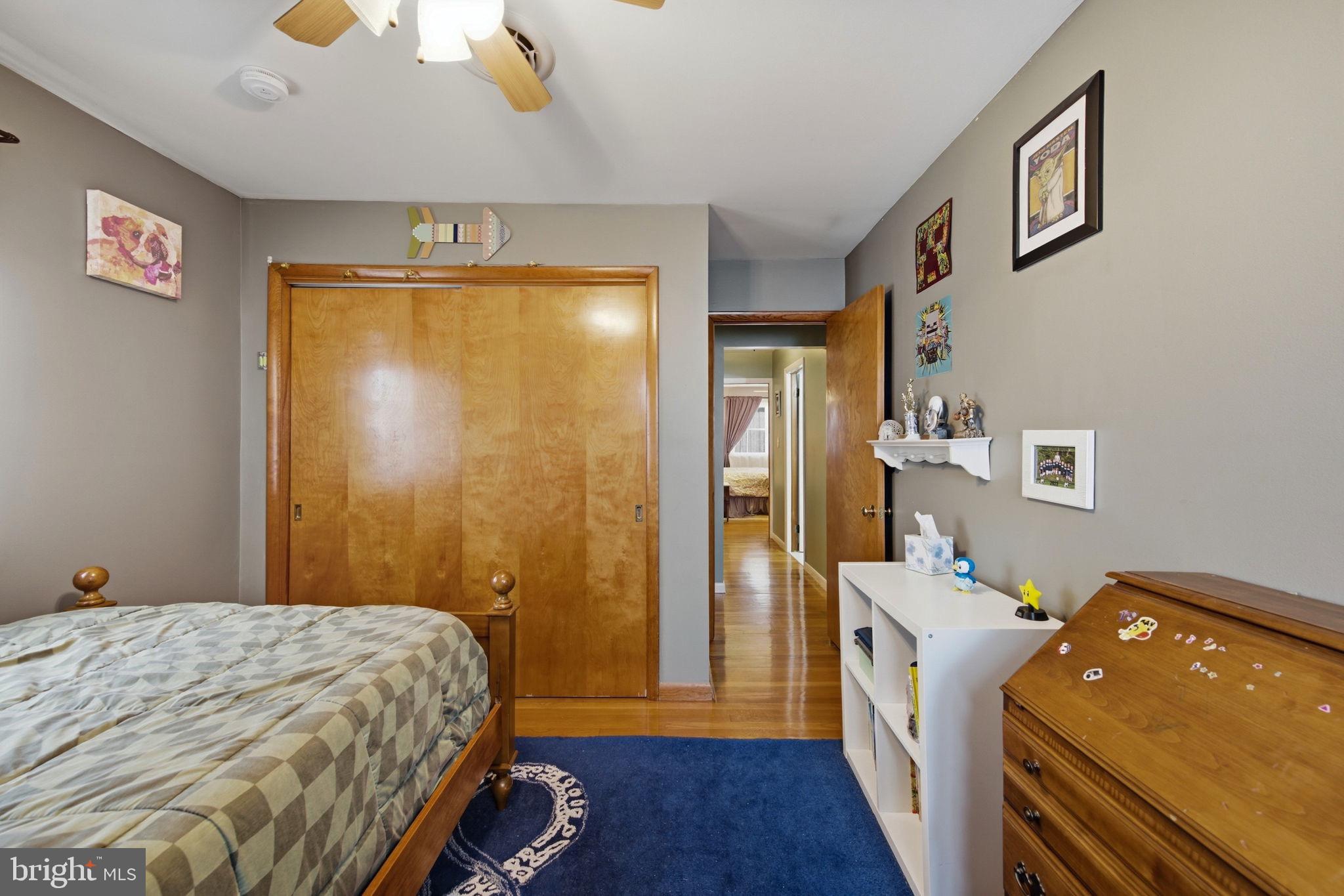 3975 Street Road Street, MD 21154 - Photo 43 of 78 a bedroom with a bed and a chandelier