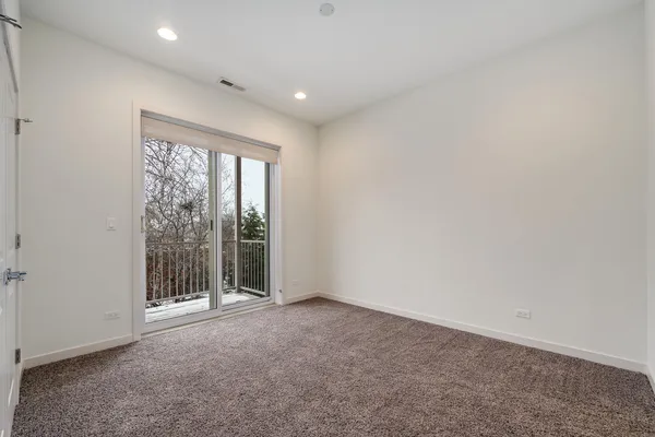 wooden floor and window in an empty room