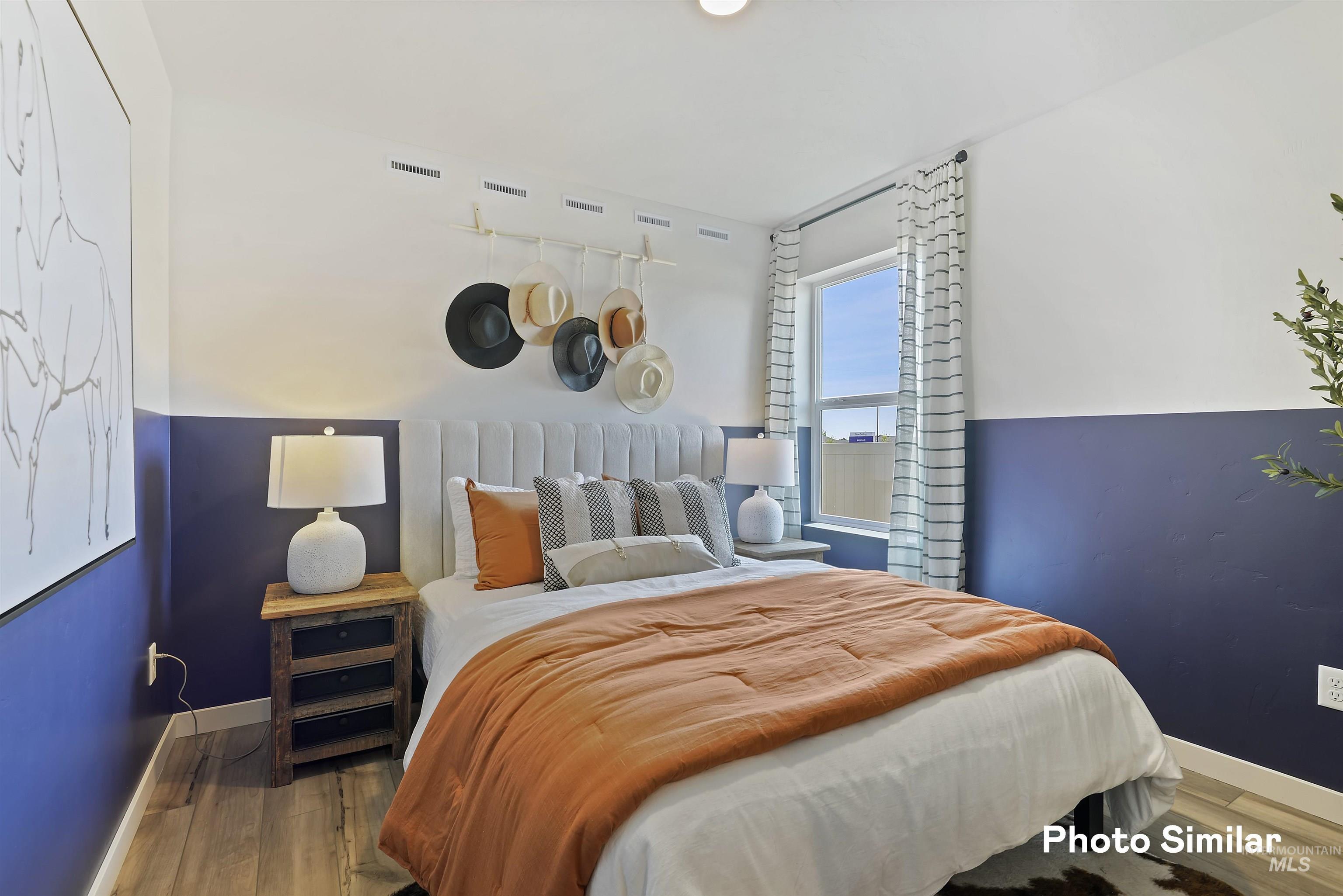 15182 Cumulus Way Caldwell, ID 83607 - Photo 18 of 26 Bedroom featuring wood finished floors