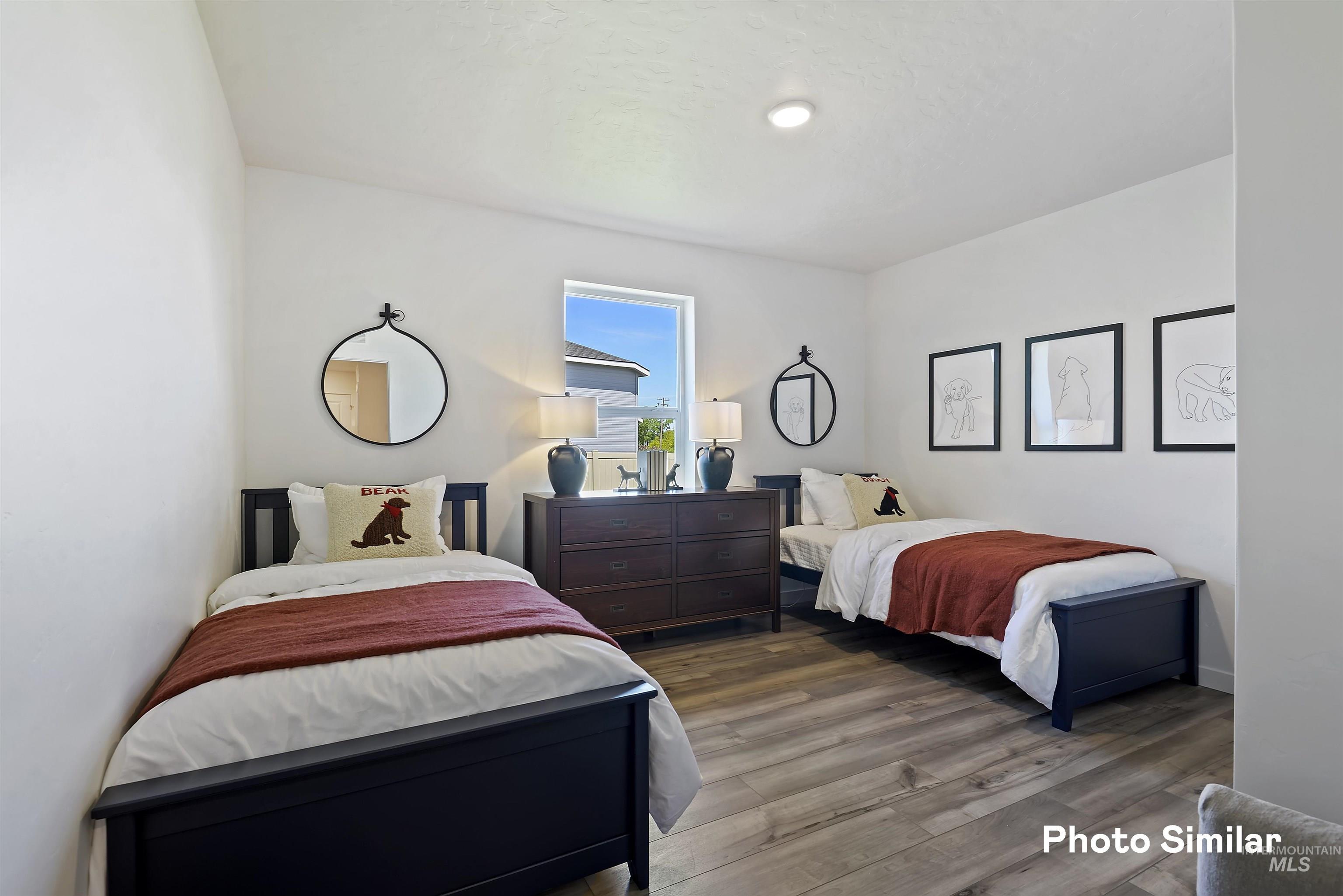 15182 Cumulus Way Caldwell, ID 83607 - Photo 19 of 26 Bedroom with wood finished floors