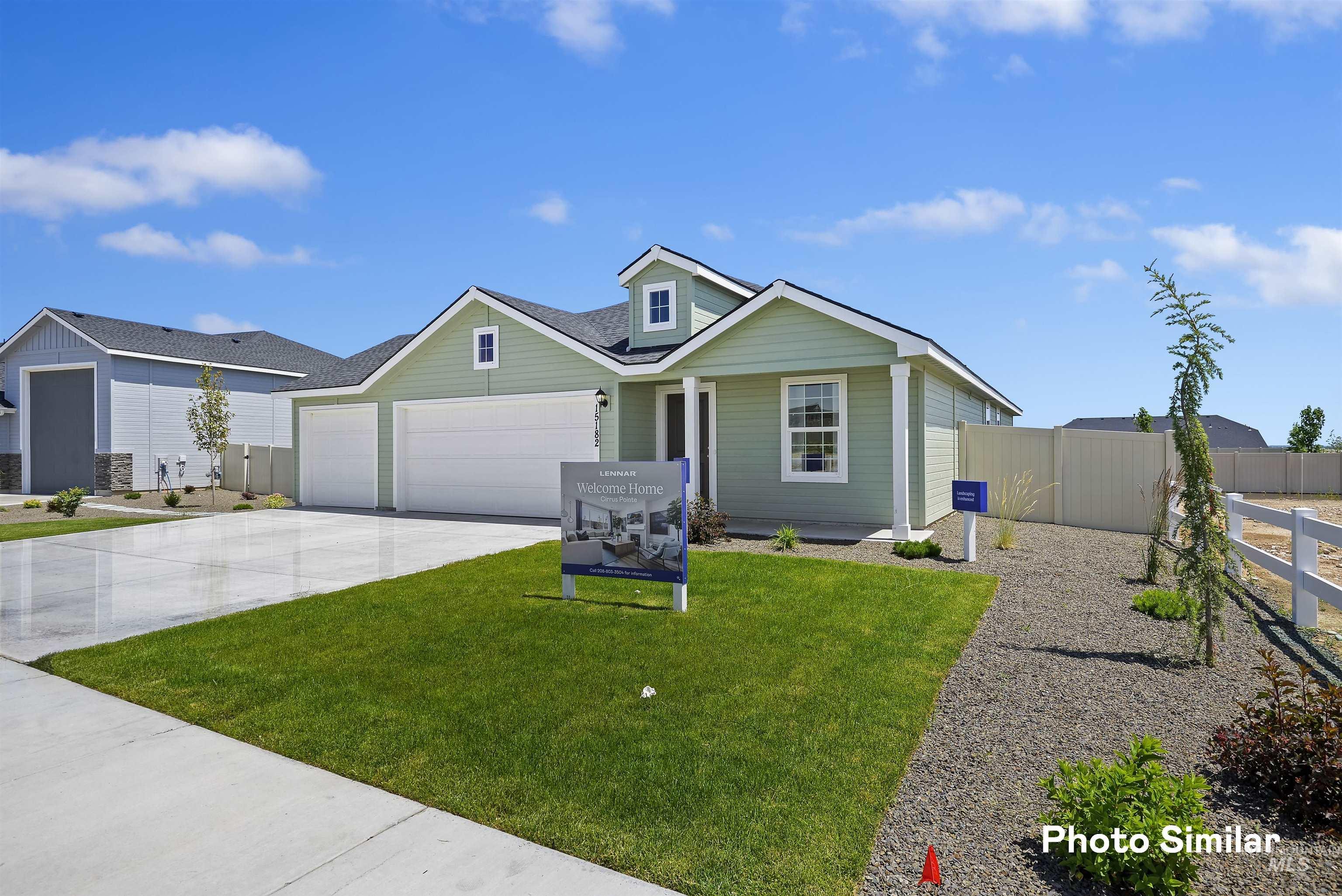 15182 Cumulus Way Caldwell, ID 83607 - Photo 2 of 26 View of front of property with a garage and driveway