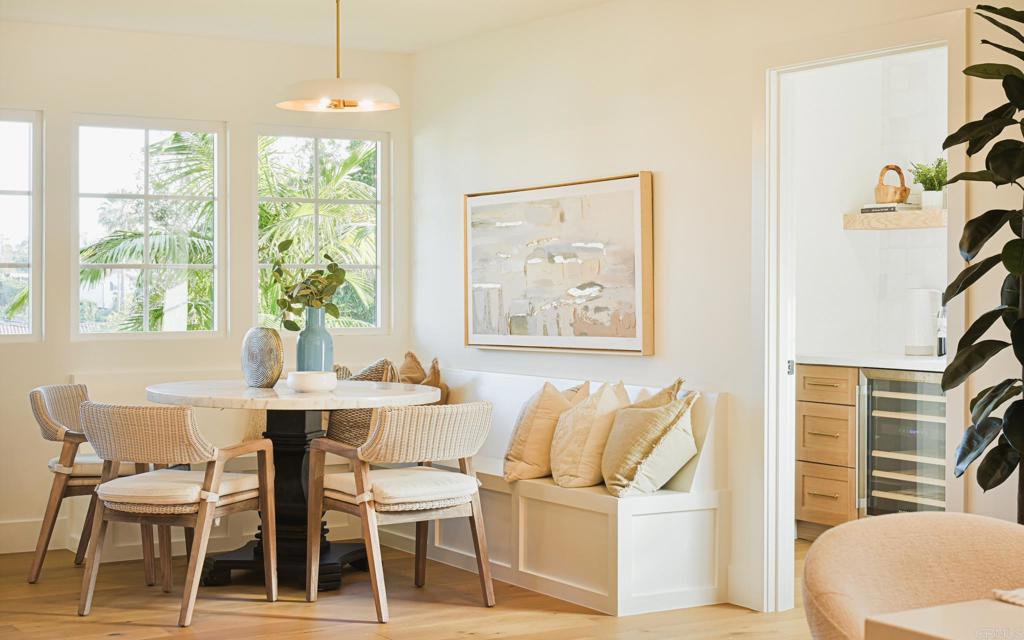 1520 Via Rancho Parkway Escondido, CA 92029 - Photo 42 of 89 a view of a dining room with furniture and a potted plant