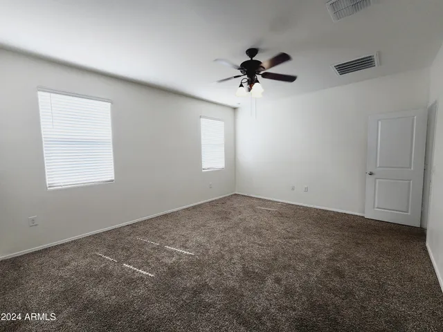 a view of a window in an empty room